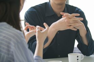 two people in discussion for emotional intelligence page