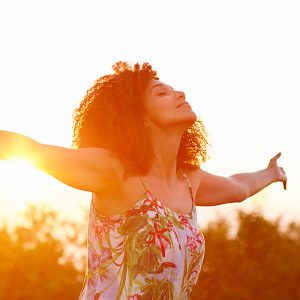 happy career woman with outstretched arms
